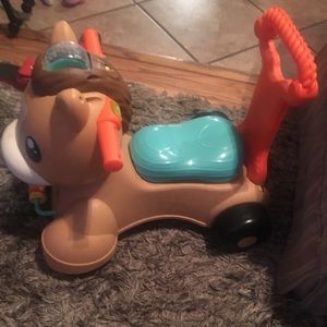 Toddler riding horse